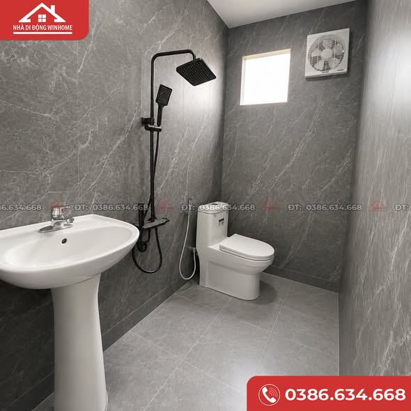 Nhà vệ sinh của mẫu nhà lắp ghép 90m2 được trang bị đủ.